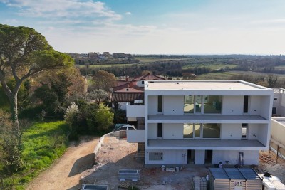 Moderno appartamento trilocale con vista mare in nuova costruzione – posizione tranquilla vicino alla spiaggia!