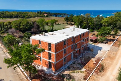 Stanovanje v gradnji v Bašaniji – Odlična lokacija, le 250 metrov od plaže! Zadnji na voljo!